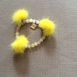 NWT Cute pastel bracelet with yellow Pom poms
